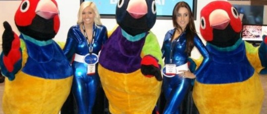 Costume characters and costume models working at a trade show