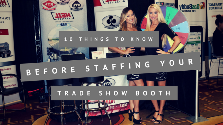 two trade show staffers at a booth