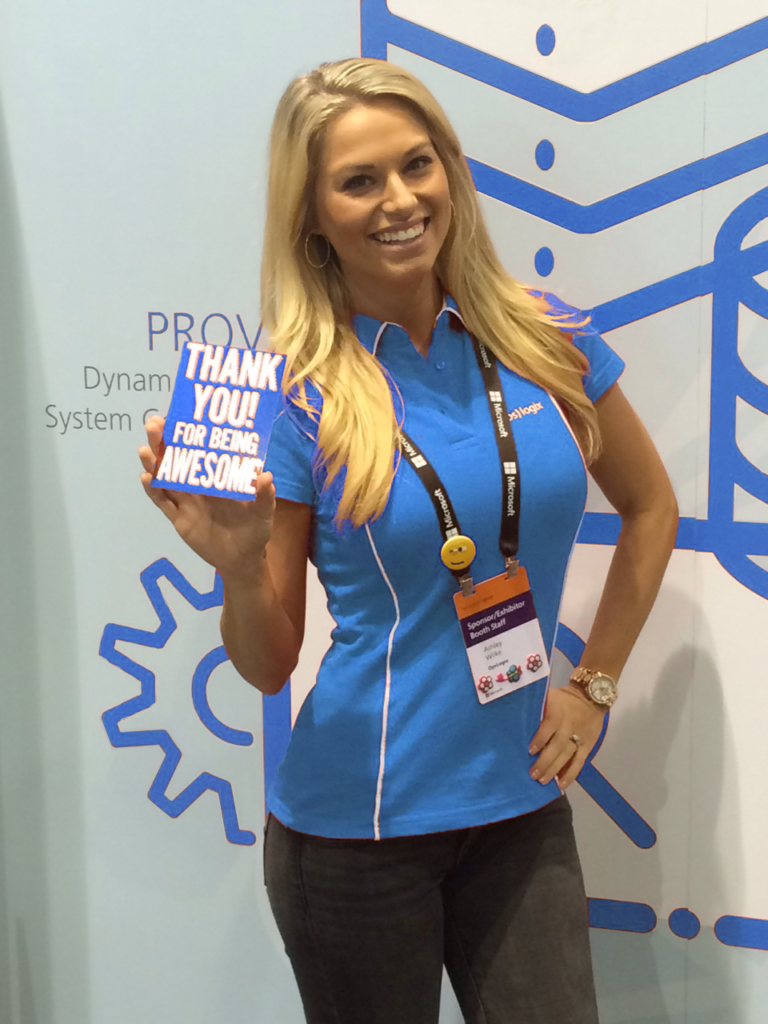 Trade show promotional model holding a flyer